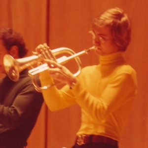 fluglehorn player in yellow turtleneck
