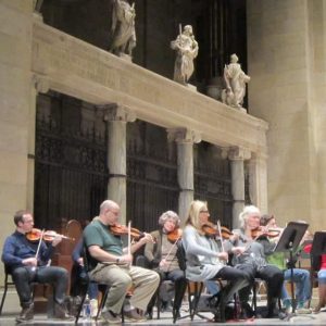 Minnesota Sinfonia with statues of saints for suite
