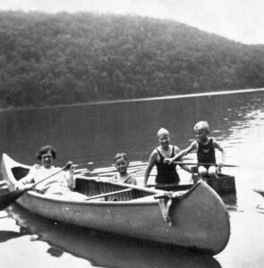 four people and canoe in summer for piano suite
